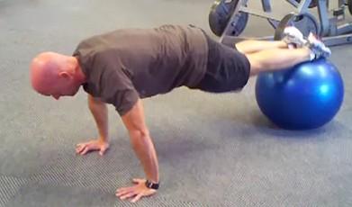 Finishers 21-24 Stability Ball Jackknife-Pushup Combo Brace your abs. Put your hands on the floor and rest your shins on the ball.