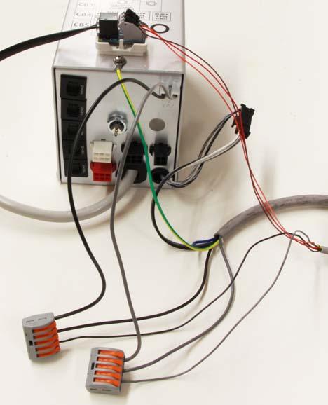 Connect the black and gray wires as shown above. If a delivery system is installed: () Disconnect the delivery system black and gray wires from the power supply.
