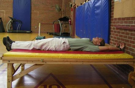 SUPINE MAT STRETCH Objective: To stretch all of the muscles of the body.