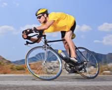 Q4.Human body temperature must be kept within narrow limits. The image shows a cyclist in a race. Ljupco/iStock/Thinkstock (a) Use the correct answer from the box to complete each sentence.