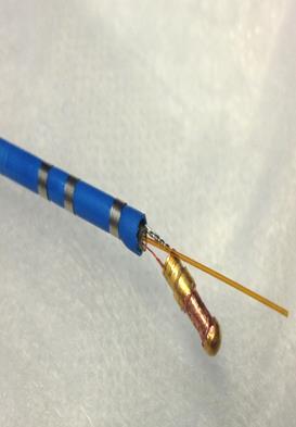 glue it to the translucent plastic linear inside the catheter body. This helps to prevent it sliding away from the distal end of the catheter tip.