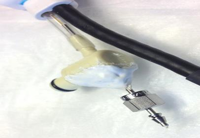 Add a vacuum/cryogen connection to the catheter handle: A corner barb to quick-disconnect adapter was placed in the flexible vacuum line tubing, with the polyimide tube sticking out of a hole that