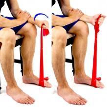 Elastic Band Elbow Supination Rest your arm on a table or thigh holding the elastic band with palm facing down as shown.