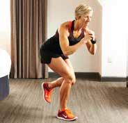 You are performing jumping jacks while maintaining the plank form.