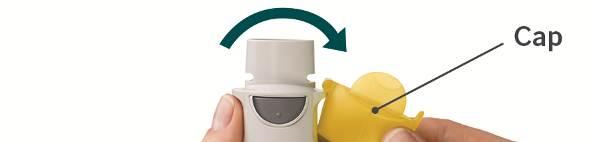 Place the inhaler on a firm surface and push down firmly until it clicks into place. 3.