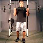 Let the bar hang down at arm's length in front of you, with your arms, shoulders and hands in a straight line.