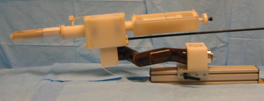 Full view of the robot Needle driver Stationary rectal sheath