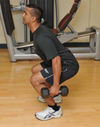 and shoulder width apart, bend at the knees and flex