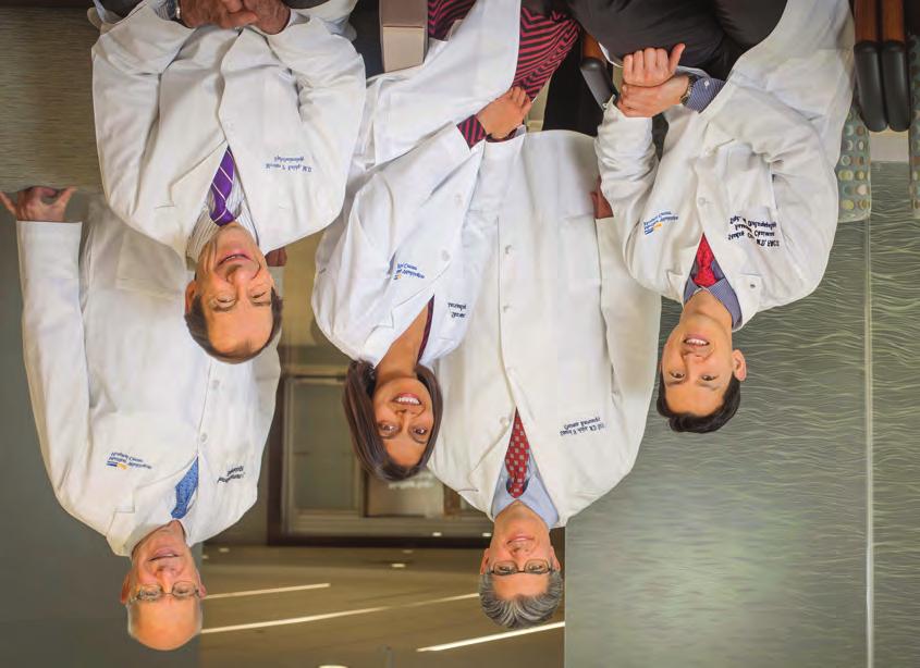 Pictured clockwise from the back left are Kenneth Burman, MD, Endocrinology; Edward Aulisi, MD, Neurosurgery; Stanley Chia, MD, Otolaryngology; Susmeeta Sharma, MD, Endocrinology; and Martin Kolsky,
