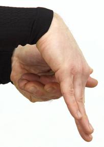 Grasp the index finger of your R hand with your L hand below the knuckle. 3.