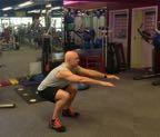 Finally, squat as deep as possible, but keep your low back tensed in a neutral position