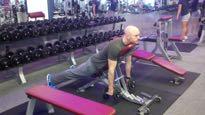 DB Chest Supported Row Lie with your chest supported by an incline bench.