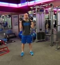 DB Lateral Lunge and Press Hold a pair of dumbbells at shoulder height with your feet