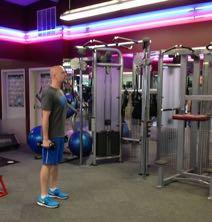 Push through the heel of the lead leg to the start position while bringing the dumbbell