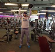DB Shoulder Press Stand with your feet shoulder-width apart