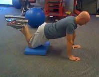 Kneeling Pushup Keep the abs braced and body in a straight line from toes/knees