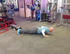 T-Pushup Keep the abs braced and body in a straight line from toes