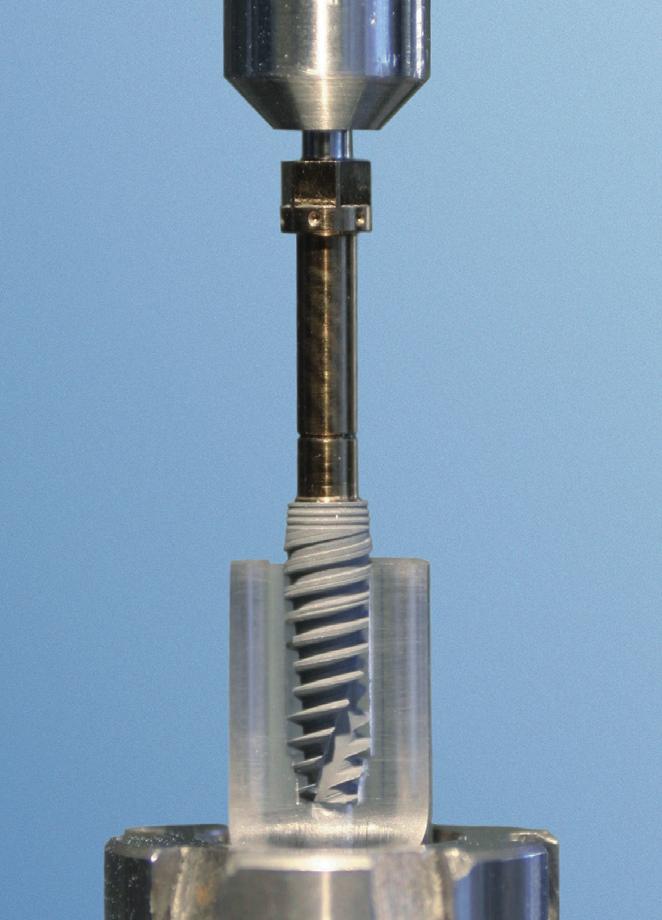 today. To test fatigue strength, an implant with standard length abutment is mounted in a fixture with a 30 off-axis orientation, then a cyclic force is applied at a frequency of 14 Hz (Figure 2).