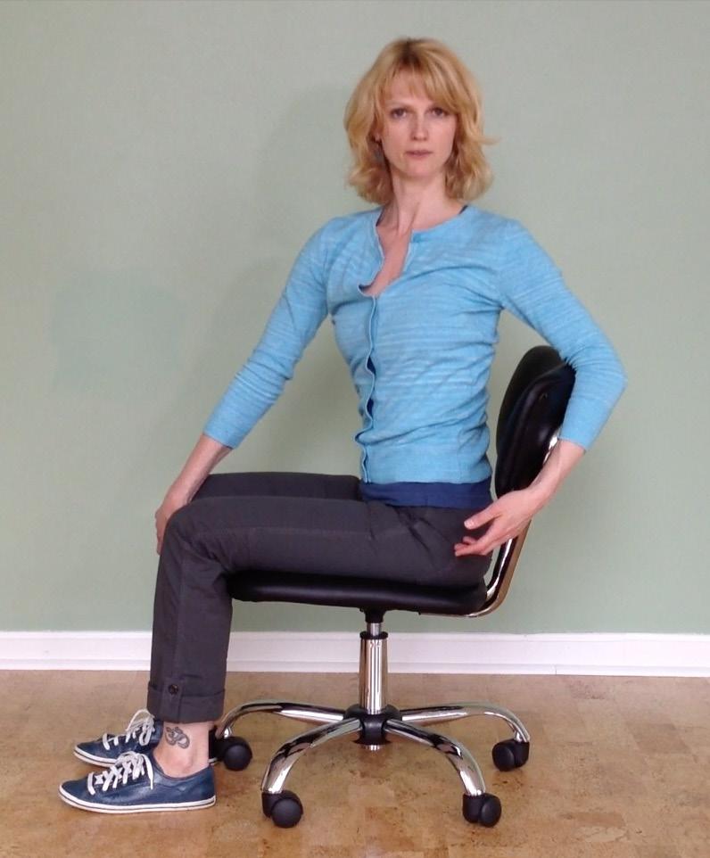 EXERCISE TWO: A Core Body Twist Targeting middle back tension & hip stiffness Sit straight in your chair, and reach your right arm forward and down between your knees.