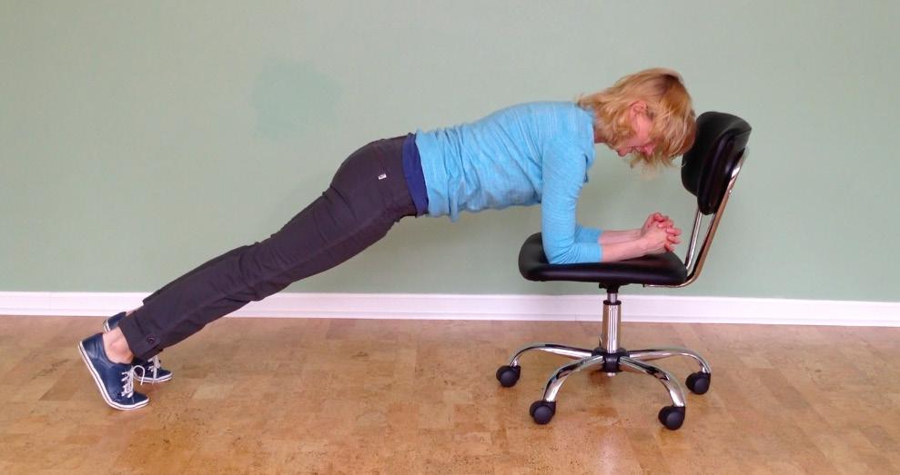 EXERCISE FIVE: Chair Plank Targeting the abdominals & core Stand facing the seat of your chair. (If your chair rolls or swivels, practice with a stationary chair at first.