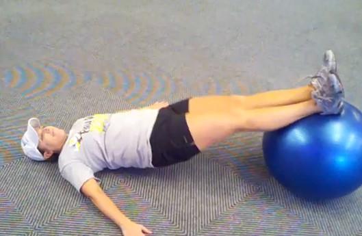 Stability Ball Leg Curl Lie on your back with the soles of your feet on a