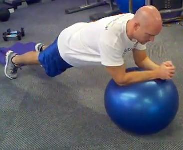 Bend your elbows and lower down into a pushup position.