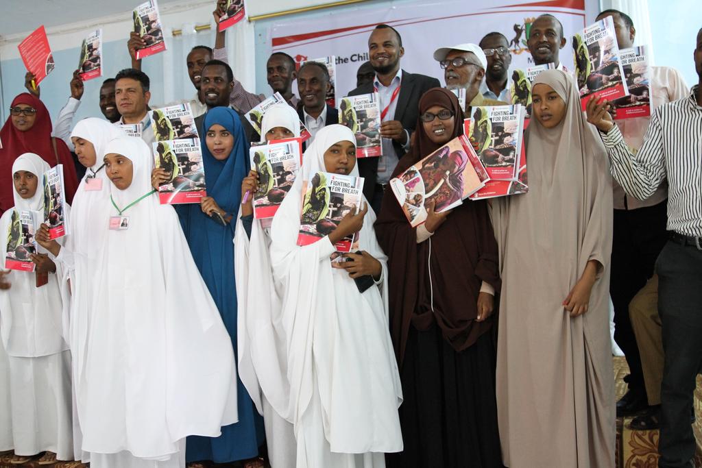 . Fighting for Breath- A Call to Action for Childhood Pneumonia National launch- Puntland, Somalia Figure 1 Participants shows copies of the Fighting for Breath Report during the launch of the report