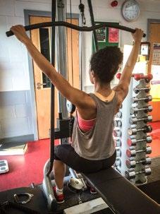 Place your hands on the bar double shoulder width apart with your palms facing away from you.