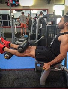 Squeeze your hamstrings to move the machine until your hamstrings are fully contracted and the top of your calves are