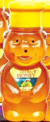 A bottle of pure honey contains the natural sweet substance produced by honey bees