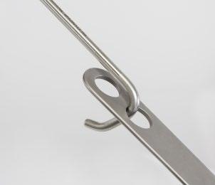 ) C D Orthopedic Hook With retractor blade in place, insert hook into the retractor blade hole and