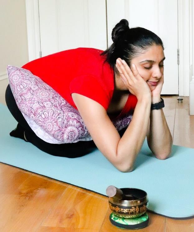 It is a resting pose that focuses on the thighs, ankles, back and also helps alleviate back pains. It stretches your spine, broadens your collarbones and chest. It calms your mind.