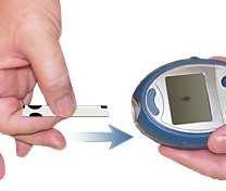 blood to a test strip and placing it in the blood glucose monitor