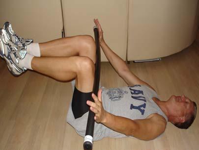 Enhanced Crunch with Head in Contact with Floor Lie on the back with feet and knees held in the air, shins parallel