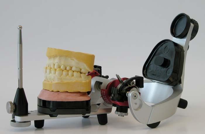 A 6.9 Articulation of the lower jaw model Turn the articulator upside down. (centric locks remain closed). Fold out the articulator.