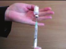Draw up reconstituted hydrocortisone into the syringe.
