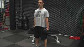 DB Squat Stand with your feet just greater than shoulder-width apart. Start the movement at the hip joint. Push your hips backward and sit back.