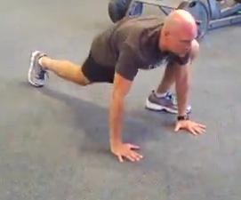 and touch your foot to the ground. Then perform a pushup in this position.