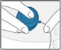 Blue handle Hold infusion set. Pull blue handle straight out to remove needle. Press the blue button to unlock. Fold blue handle until locked.