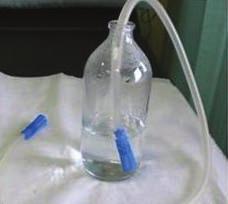 expiratory pressure. Rotating the handle quickly provides high-frequency oscillations and a lower expiratory pressure.
