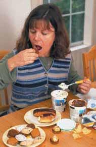 The amount of food consumed during a binge varies but is typically on the order of 3400 Calories, while a normal young woman may consume only about 2000 Calories in an entire day.