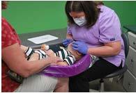 Oral Health Assessments - Positioning Knee to Knee Effective with young