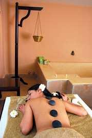 Hot Stones Basaltic Abhyanga massage with water-heated basalt stones of different sizes to give a slow deep tissue massage, especially in areas that tend to accumulate tension and stagnation of