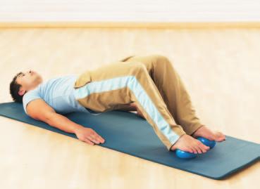 Hundred Half Roll Back Starting position: Lying on back on mat, imprinted position; legs bent in tabletop