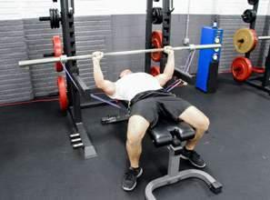 BENCH PRESS BENCH PRESS WITH DUMB- BELLS No pegs, no problem! Position yourself on a flat bench and loop each band around dumbbells as pictured.