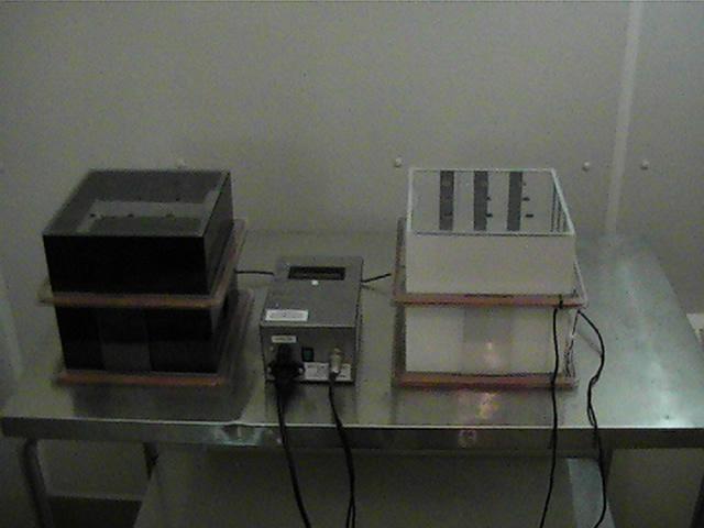 generator: Helmholtz coils surround the individual boxes.