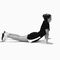Spinal extension is cleared by performing a pressup in the pushup position.