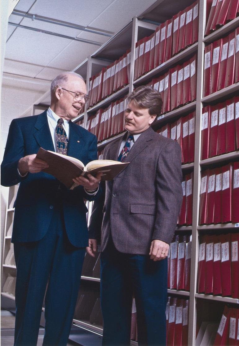 Comparison of the NDA Documentation In the picture above, the volume that Charles Thiel (left) is holding is the original NDA for the epinephrine MDI.