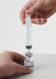 b) Release pressure on the plunger and pull back slowly on the plunger of the syringe to fill the