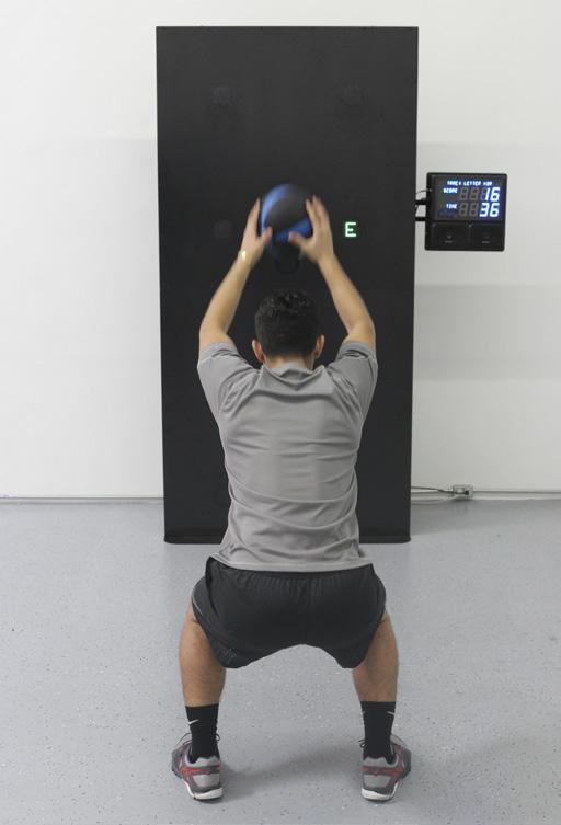 No Wall Sit Objective: Reinforcing a fundamental movement, and full body conditioning Equipment: SMARTfit Trainer & medicine ball Organization: Player stands at 6 mark with medicine ball in hands.